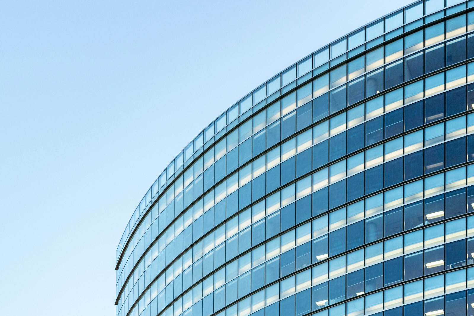 Curved glass façade of a modern office building